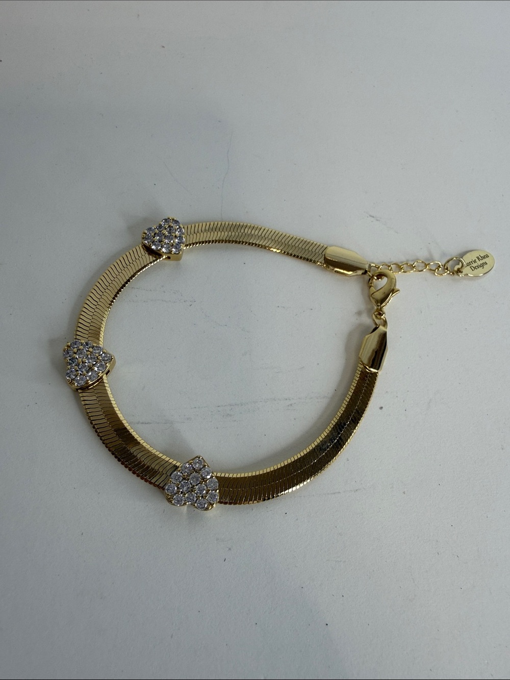Carrie Rhea Designs Gold Herringbone Chain Bracelet with Pavé Crystal Hearts